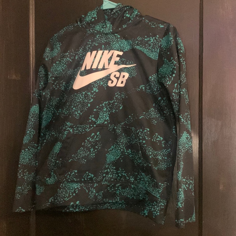 Teal and black Nike hoodie. In great condition. Brand new